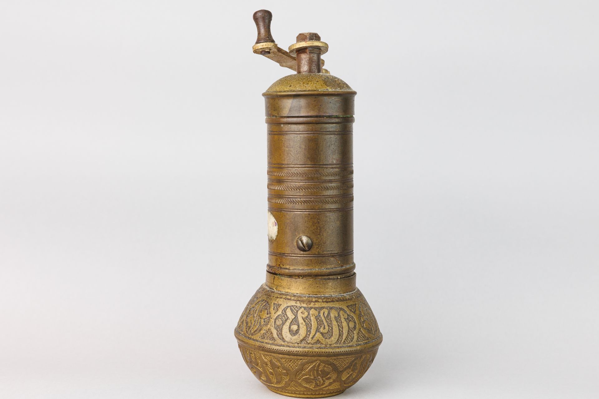 Antique manual bronze coffee grinder