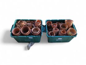 A collection of terracotta pots, various sizes