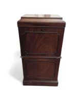 A 19th century mahogany storage cabinet, the top w