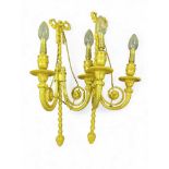 A pair of French style gilt metal twin branch wall