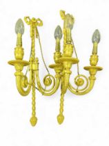 A pair of French style gilt metal twin branch wall