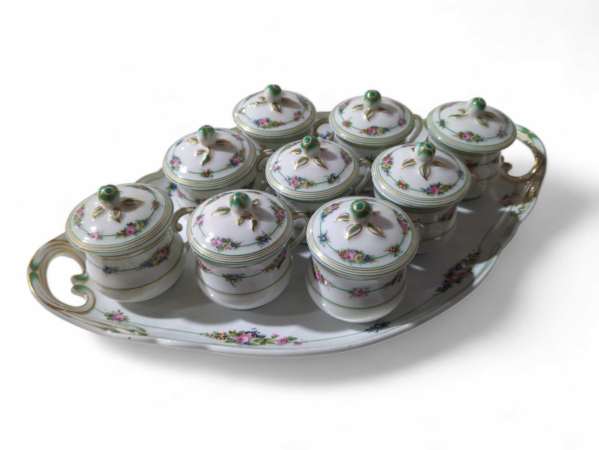 A set of continental porcelain hot chocolate pots