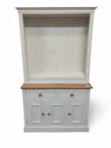 A white painted dresser, with light oak accents, t