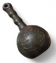 An unusual oriental metal bell, decorated with dra