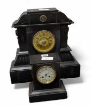 A large black slate mantel clock, with gilt metal