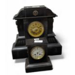 A large black slate mantel clock, with gilt metal