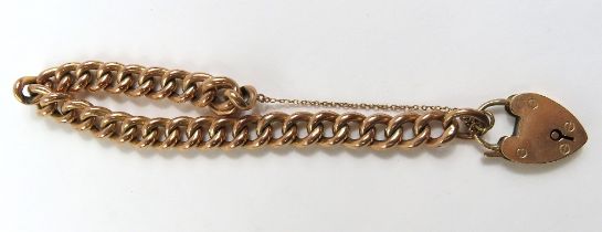A 9ct rose gold hollow curb link bracelet, each li