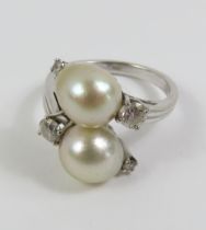 Gubelin - a cultured pearl and diamond ring, the t
