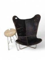 A hide butterfly chair, with metal frame; and a 20