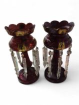 A pair of Victorian or early 20th century red glas