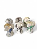 Six satirical pottery figures of the Royal Family