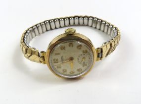 A ladies 9ct gold cased Rotary watch face, on expa