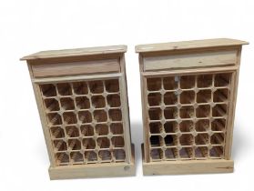 A pair of unfinished pine wine racks, 83.5cm high,