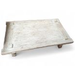 A limed oak coffee table, on four block legs, 48cm