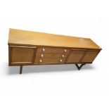 A low mid-20th century sideboard, the three short