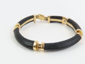 A contemporary bracelet, comprised of five links,