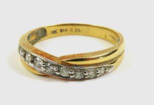 An 18ct gold diamond set half eternity ring, the r