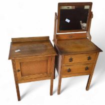 An early 20th century light oak dressing chest, wi