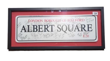 An Albert Square sign, autographed by various memb
