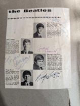 Beatles interest - a signed page from a magazine d