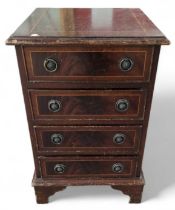 A small chest of four drawers 62cms high 38.5cms w