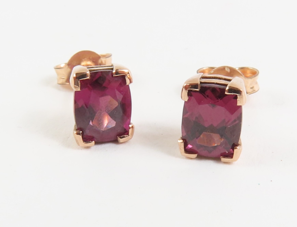 A pair of 9ct rose gold garnet set stud earrings, - Image 2 of 4