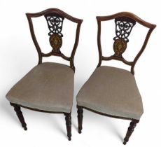 A pair of Victorian inlaid parlour chairs with stu