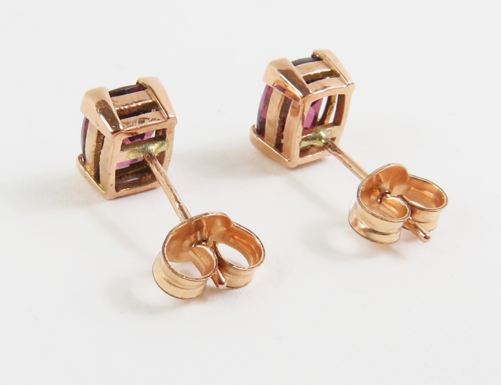 A pair of 9ct rose gold garnet set stud earrings, - Image 4 of 4