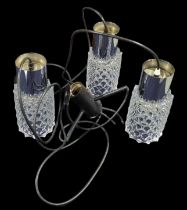 A 1970's Heals light fitting with moulded clear gl