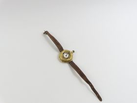 A continental pocket watch style wrist watch, the