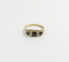 A 9ct gold sapphire and diamond Victorian style ri