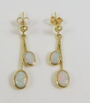 A pair of 18ct gold white opal drop earrings, the