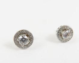 A pair of diamond stud earrings, the round brillia