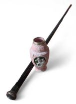 A silver topped ebonised walking cane together wit