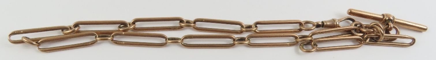 A 9ct rose gold watch chain, with alternating trom