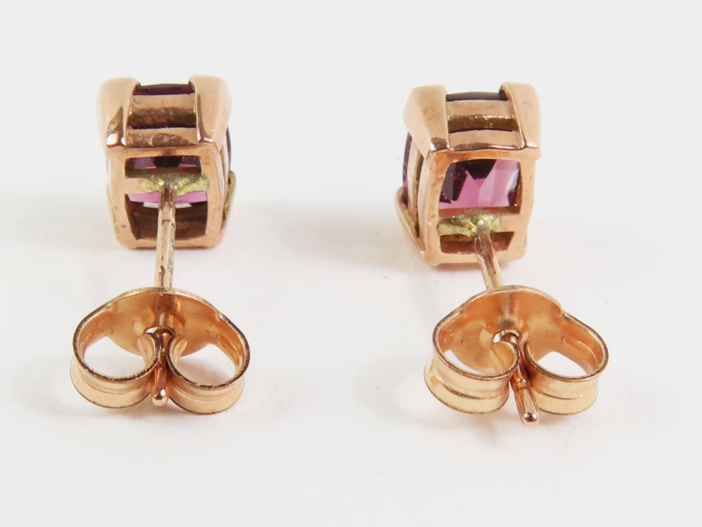 A pair of 9ct rose gold garnet set stud earrings, - Image 3 of 4