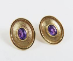A pair of contemporary design 9ct gold amethyst se