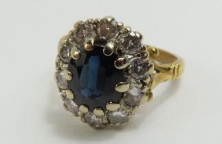 A sapphire and diamond cluster ring, the oval sapp