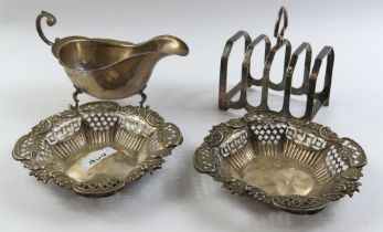 A silver four section toast rack, Sheffield, 1931,