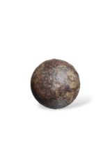 An iron canon ball, recovered from a well on the S