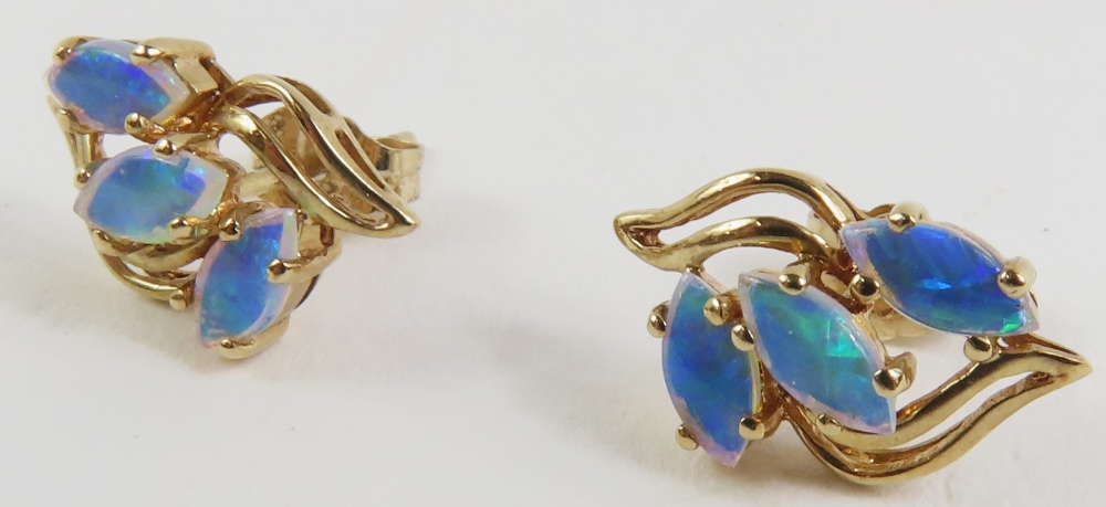 A pair of 9ct gold opal set stud earrings, the thr - Image 2 of 6
