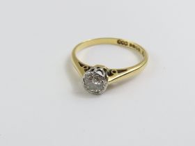 An 18ct gold diamond solitaire ring, the round bri