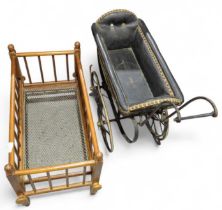 A small Victorian style toy pram together with a d