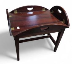 A mahogany butlers tray on stand 60cms high