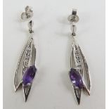 A pair of 9ct white gold amethyst and diamond drop