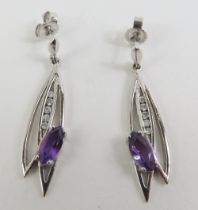 A pair of 9ct white gold amethyst and diamond drop