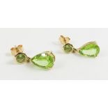 A pair of 9ct gold peridot drop earrings, with a r