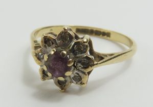 A 9ct gold amethyst and diamond cluster ring, fing