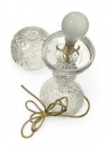 A cut glass table lamp with cut glass globe, 48cms