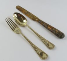 A silver gilt set comprising a fork, knife and spo